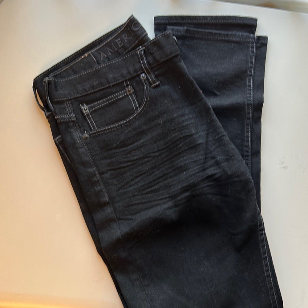 Barely worn American Eagle black slim/skinny jeans. Athletic stretch.